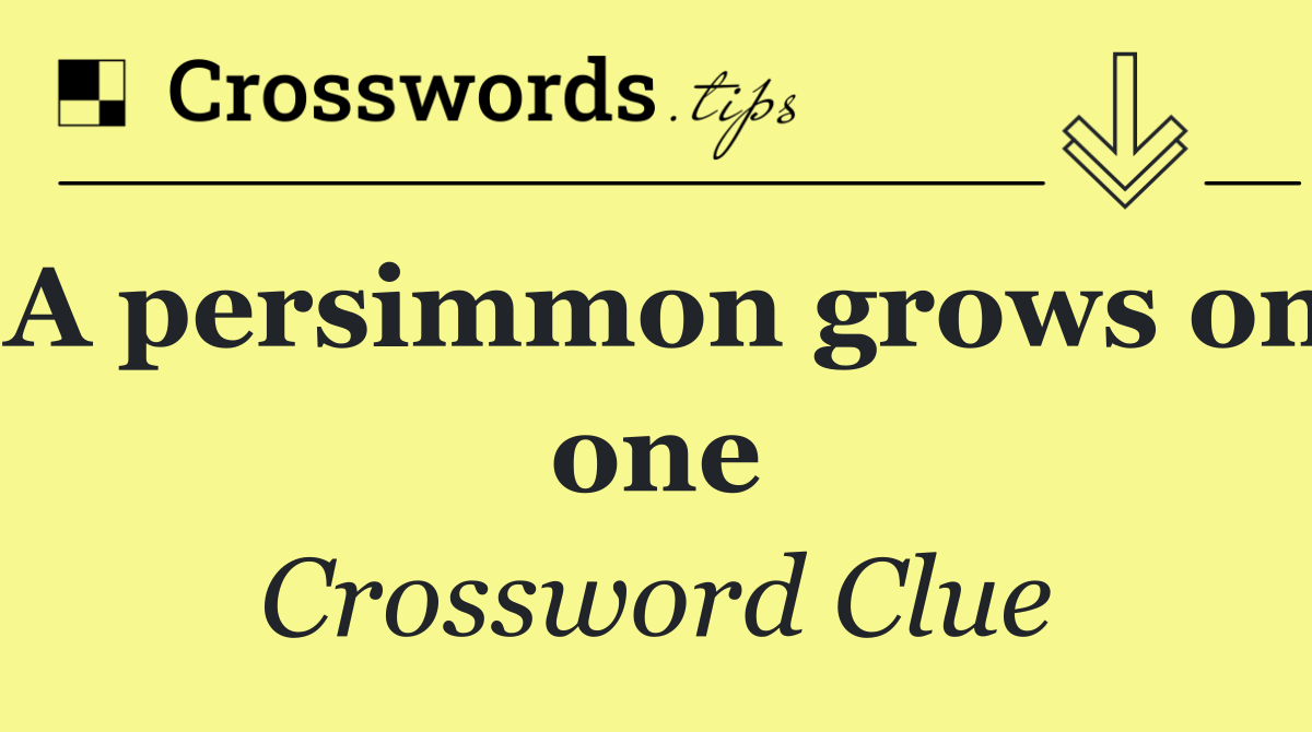 A persimmon grows on one