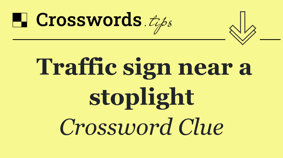 Traffic sign near a stoplight